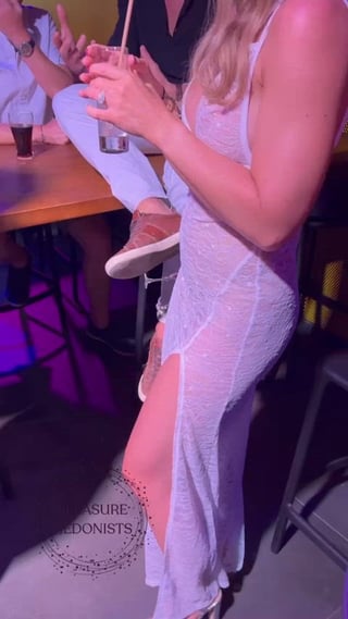 Wearing a see thru dress at the bar